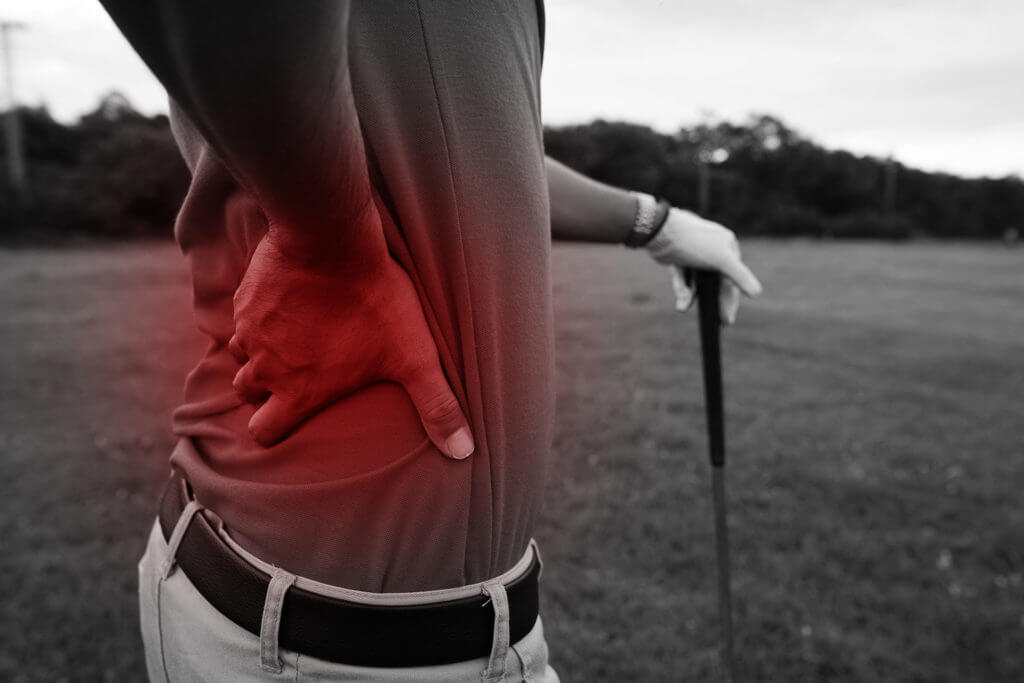 golfer experiencing back pain